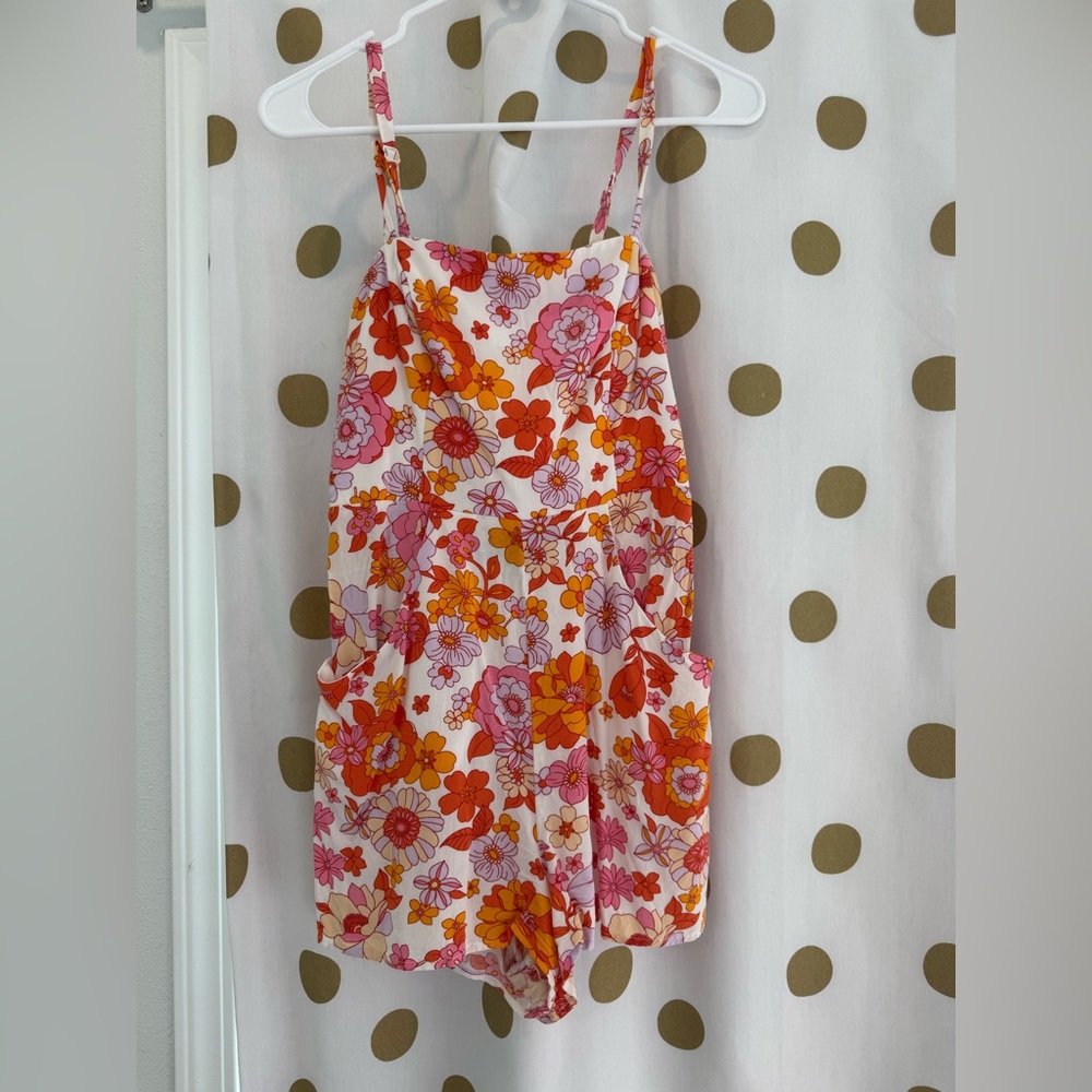 Midnight Doll floral romper with tie in the back
